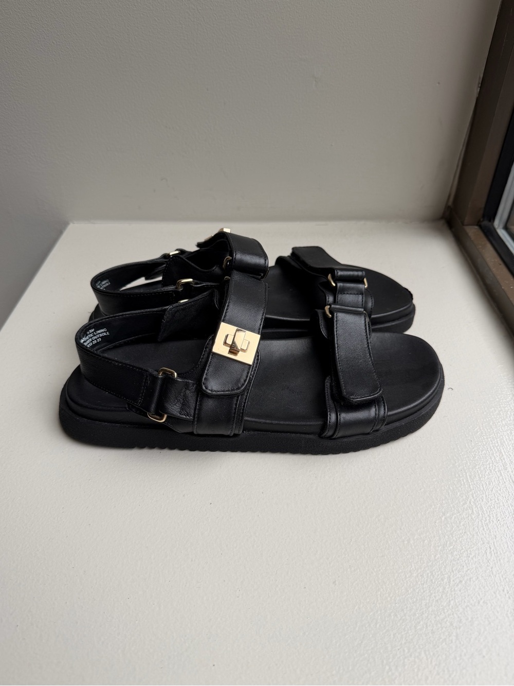 Steve Madden Women’s Mona Black Leather Buckle Strap Sandals